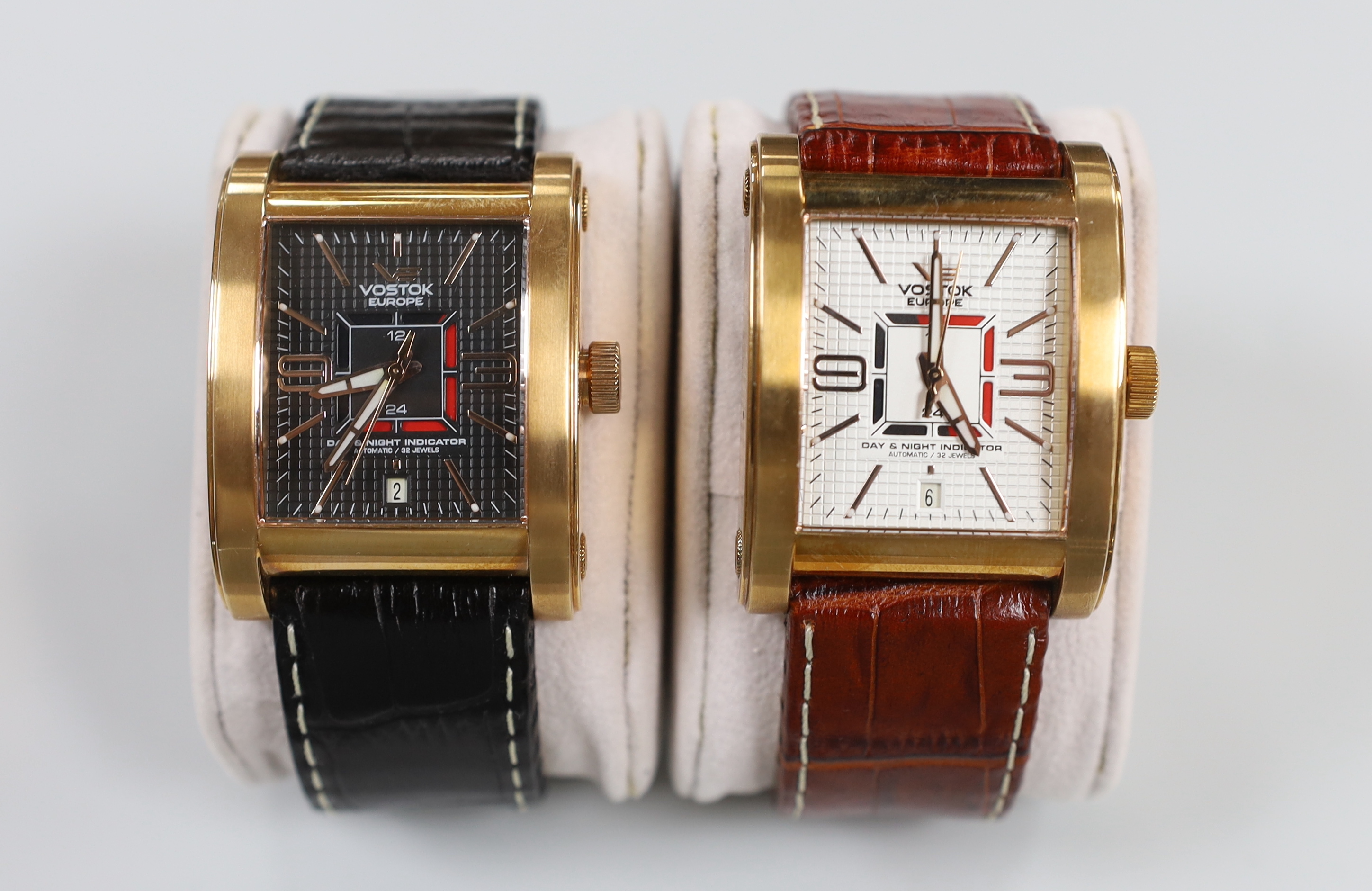Two gentleman's modern gilt steel Vostok Europe Red Square automatic wrist watches, both with day/night indicators.